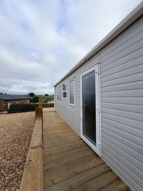 Blenheim decking and space beside the caravan