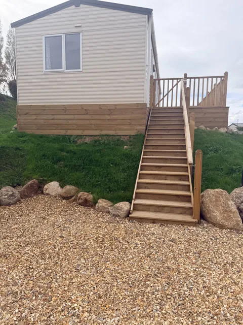 Kensington — decking stairs up to van