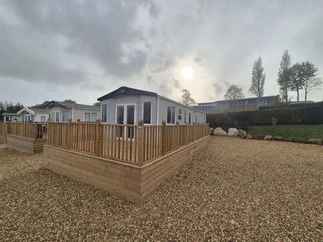 Blenheim decking and open space around the caravan